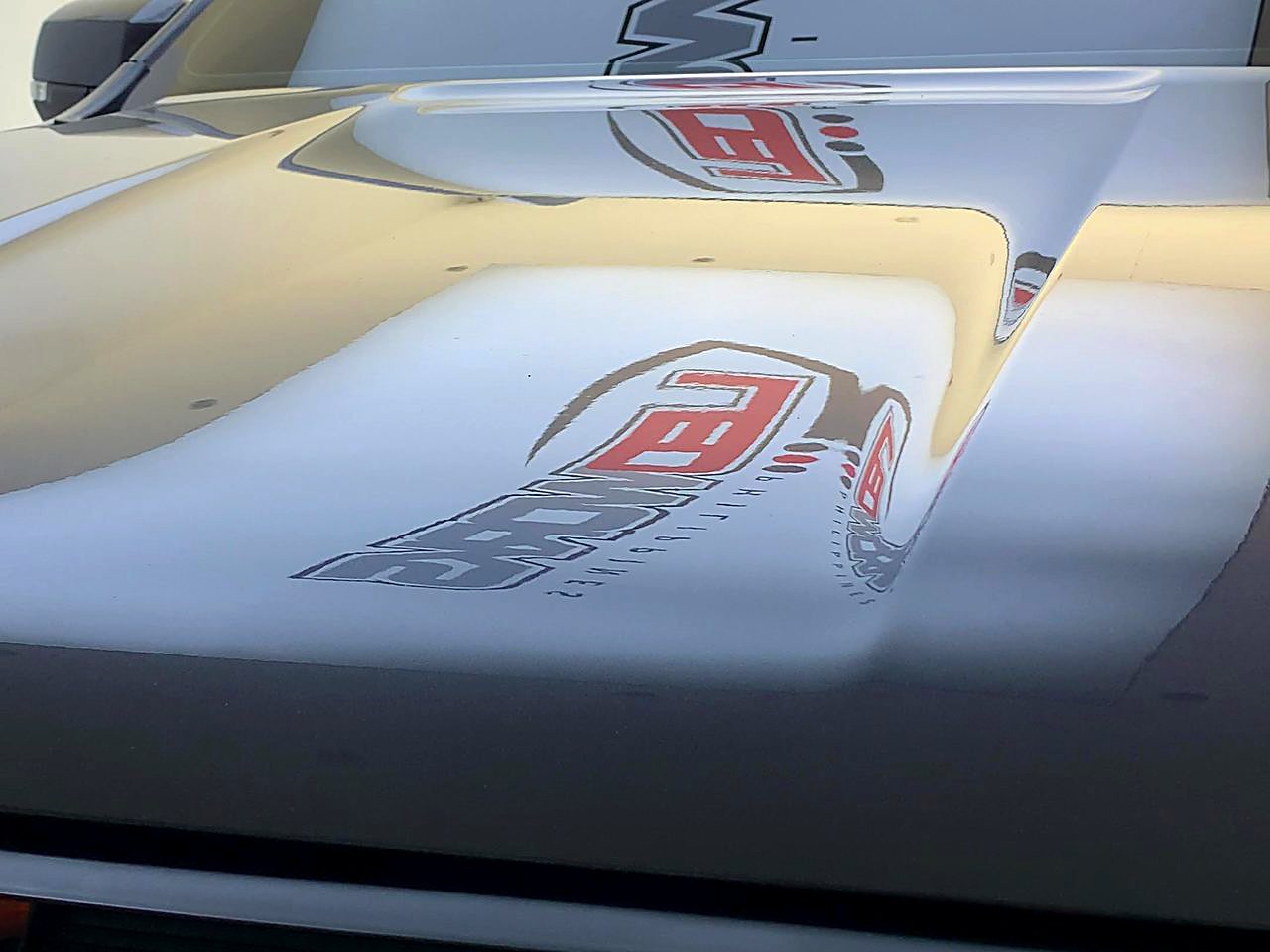 Ford Ranger Raptor hood with LEDWorks logo mirrored in the coating